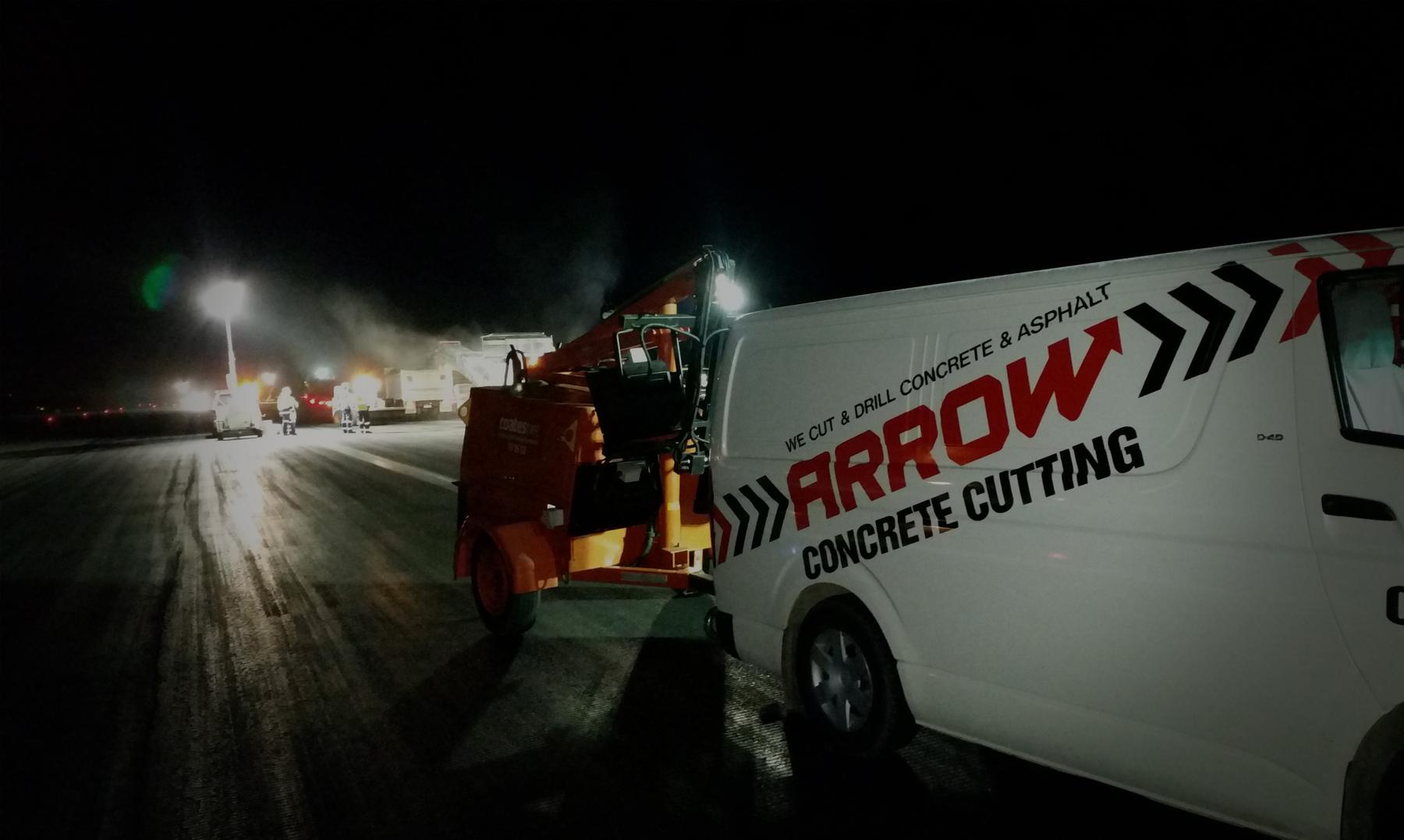 The Arrow Concrete Cutting van and a cutting rig on a night job